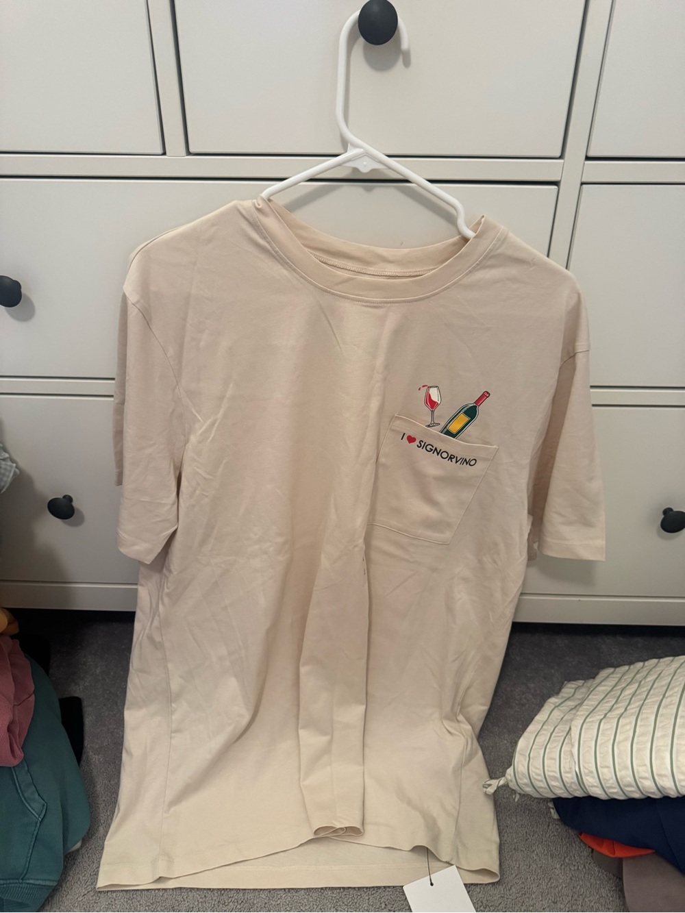 Men Beige Pocket T-Shirt with Wine Graphic